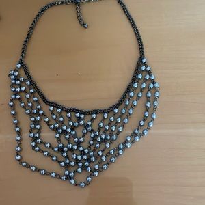 Plastic pearl necklace with matching earrings